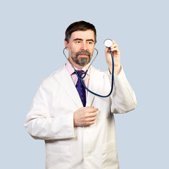 doctor with a stethoscope listening