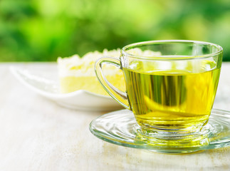 Cup of herbal tea and fresh cake