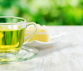 Cup of herbal tea and fresh cake