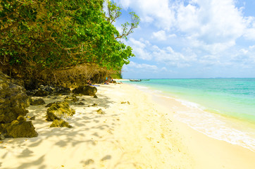 Deserted white beach on a tropical island