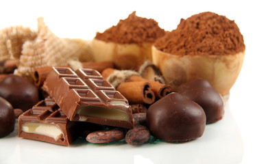 Composition of chocolate sweets, cocoa and spices, isolated
