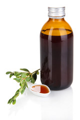 Cough syrup isolated on white