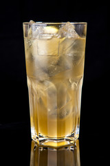 yellow cocktail isolated on black