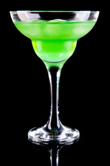 Green margarita melon cocktail isolated on black
