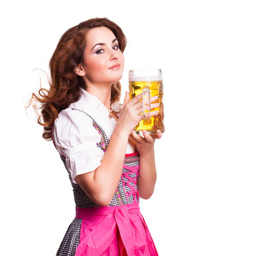 attraktive junge Frau im Dirndl mit Bierkrug