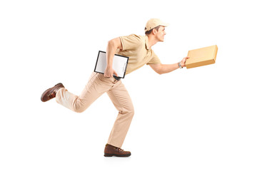 Full length portrait of a delivery boy in a rush delivering a pa