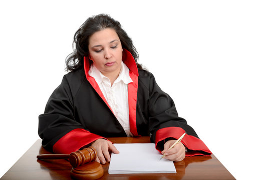 Female judge taking notes isolated on white