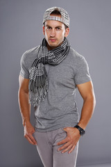 Athletic young male in grays