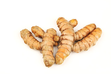 Group of Turmeric Roots on a White Background