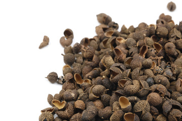 Allspice berries macro on white background
