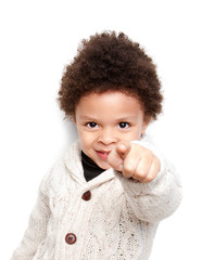 Cute child smiling and pointing at you - obrazy, fototapety, plakaty