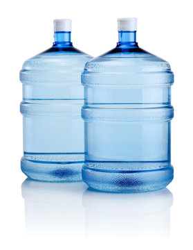 Two big bottles of water isolated on a white background