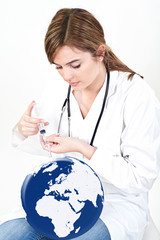 doctor woman give injection to world globe isolated on white
