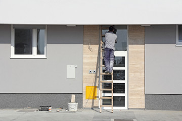 Worker on a ladder