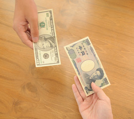 human hands exchanging money