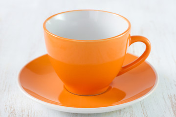 orange cup on white background