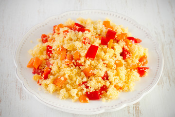 boiled couscous with pepper and carrot