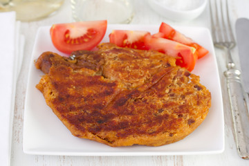 grilled alheira in white dish