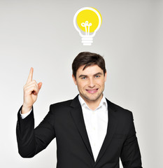 Business man with an idea bulb