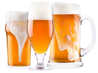 Frosty fresh beer collection with foam isolated