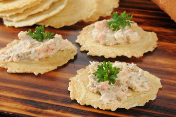 Smoked salmon dip on gourmet crackers
