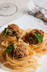 Italian pasta with beef in tomato sauce