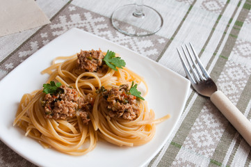 Italian pasta with beef in tomato sauce