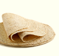 Whole wheat tortillas on a white background