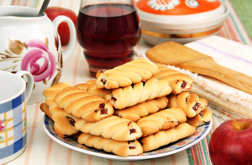 cookies, drink and an apple.
