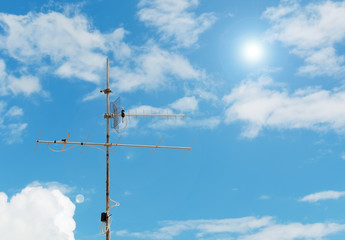 tv antenna and clouds