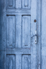 Fototapeta na wymiar blue old closed door
