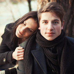 Outdoor portrait of young sensual couple