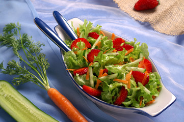 Light, healthy salad with strawberries