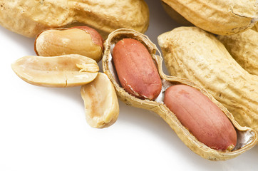 Peanuts close up on the white background