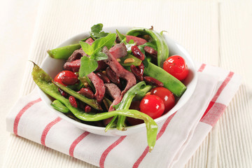 Vegetable salad with strips of beef