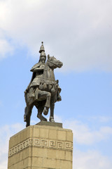 closeup of figure statue, in a pure color background, China.