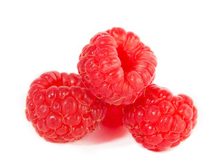 Fresh raspberries isolated on white background