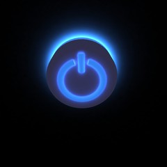 3D power button lighting in darkness.