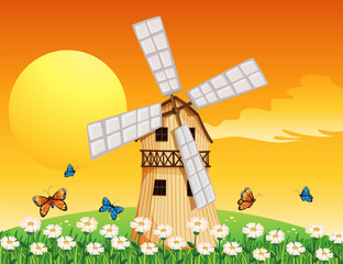A wooden windmill at the garden