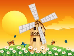 Abwaschbare Fototapete Schmetterling Eine hölzerne Windmühle im Garten