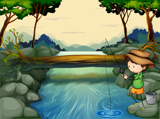 Ein Junge, der am Fluss fischt