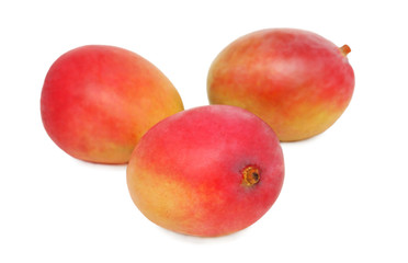 Three ripe mango on white background
