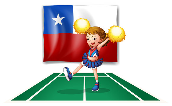 A cheerleader dancing in front of the Chile flag