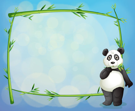 A panda beside a framed bamboo tree