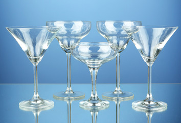 Cocktail glass set on blue background