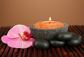 Candle in stone bowl with marine salt,