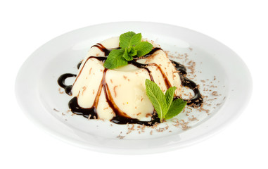 Panna Cotta with chocolate sauce, isolated on white