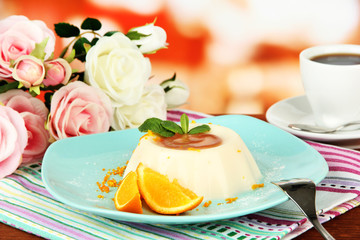 Panna Cotta with orange zest and caramel sauce,