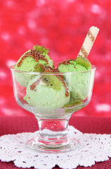 Delicious ice cream on table on bright background