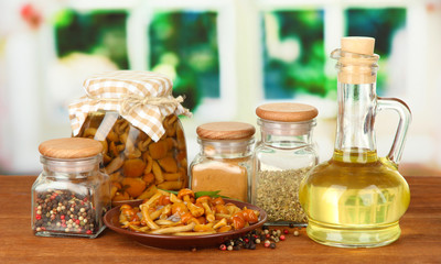 Composition of delicious marinated mushrooms, oil and spices